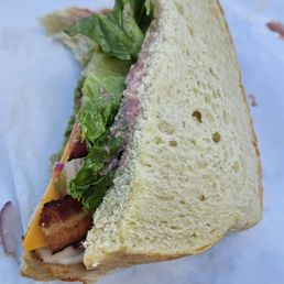 Santa Fe turkey sandwich with avocado and bacon on sourdough Santa Fe turkey sandwich with avocado and bacon on sourdough