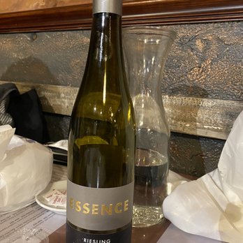 Rino's Place - You have to buy wine by the bottle here! $33 per bottle. This Riesling was great. - Italian Near Me - Boston, Massachusetts Rino's Place - You have to buy wine by the bottle here! $33 per bottle. This Riesling was great. - Italian Near Me - Boston, Massachusetts