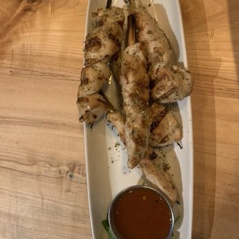 The Naked Olive - Chicken Skewers with chili sauce. appetizer - Mediterranean Near Me - Kennett Square, Pennsylvania The Naked Olive - Chicken Skewers with chili sauce. appetizer - Mediterranean Near Me - Kennett Square, Pennsylvania