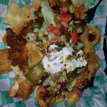 Dublin Square - These nachos were better than the norm. Potato chip under chili w/ lettuce, tomatoes, sour cream and jalapenos absolutely amazing - Pubs Near Me - Fort Worth, Texas Dublin Square - These nachos were better than the norm. Potato chip under chili w/ lettuce, tomatoes, sour cream and jalapenos absolutely amazing - Pubs Near Me - Fort Worth, Texas