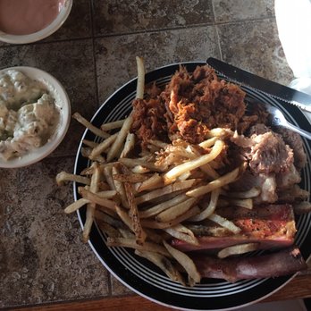 Bare Bones BBQ - Three meat platter with potato salad and french fries on the side. - Barbeque Near Me - Gatesville, Texas