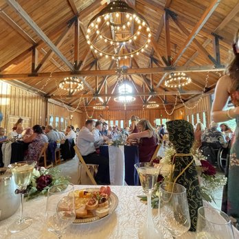 A Paper Flower Wedding - Our head table had appetizers, water and champagne in our special glasses all ready to go! - Wedding Planning Near Me