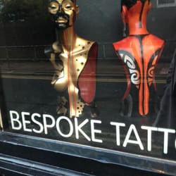 Nine - Unusual window display for a tattoo parlour! :P