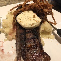Room temperature steak w/ frozen butter on top. This was after I'd sent it back once for being served cold.