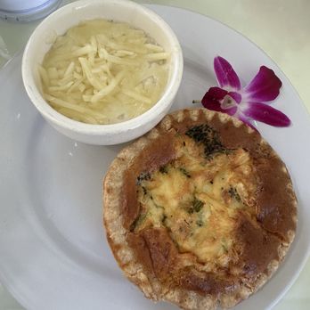 The Breakfast House - Broccoli cheddar quiche with cheese grits - Breakfast & Brunch Near Me - Sarasota, Florida The Breakfast House - Broccoli cheddar quiche with cheese grits - Breakfast & Brunch Near Me - Sarasota, Florida