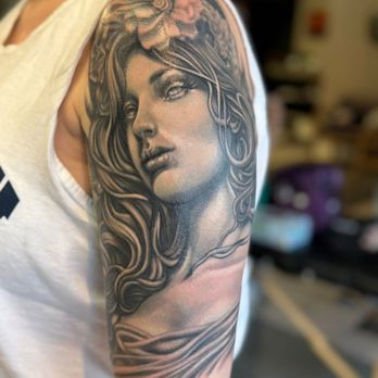 Satori Ink - Realistic black and grey Athena upper arm tattoo by Shaun Washburn - Tattoo Near Me - Bethlehem, Pennsylvania Satori Ink - Realistic black and grey Athena upper arm tattoo by Shaun Washburn - Tattoo Near Me - Bethlehem, Pennsylvania