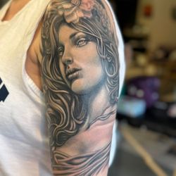 Satori Ink - Realistic black and grey Athena upper arm tattoo by Shaun Washburn