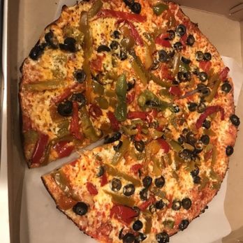Colony Grill - Cherry peppers, green bell peppers and black olives with (regular amount) hot oil drizzle. - Pizza Near Me - Arlington, Virginia Colony Grill - Cherry peppers, green bell peppers and black olives with (regular amount) hot oil drizzle. - Pizza Near Me - Arlington, Virginia