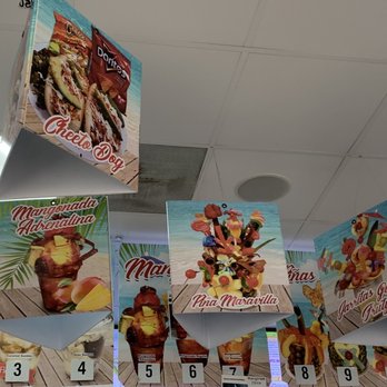 Blue Ocean Smoothies - a variety of items hanging from the ceiling - Juice Bars & Smoothies Near Me - Houston, Texas Blue Ocean Smoothies - a variety of items hanging from the ceiling - Juice Bars & Smoothies Near Me - Houston, Texas
