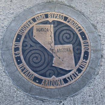 Hoover Dam - On the memorial bridge you can stand in both Nevada and Arizona on the state line. - Landmarks & Historical Buildings Near Me - Boulder City, Nevada