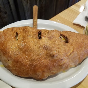Treve's Pizza - Huge (small) calzone - Pizza Near Me - Marlette, Michigan