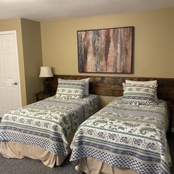 Hideaway Retreat Center - 2 single beds in the same room that appear that you can push together if needed.