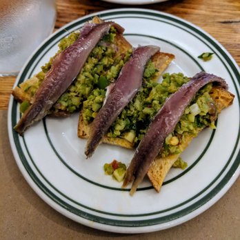 Gocciolina - Chopped olive crostini with cetara anchovies $4 - Italian Near Me - Durham, North Carolina Gocciolina - Chopped olive crostini with cetara anchovies $4 - Italian Near Me - Durham, North Carolina