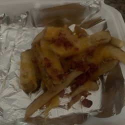 Colton's Steakhouse & Grill - An appetizer of cheese fries for 9.99.