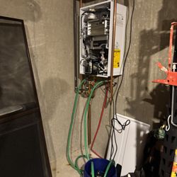 Armored Plumbing - Performed a full tankless water heater flush to remove buildup, improve efficiency, and extend system life.