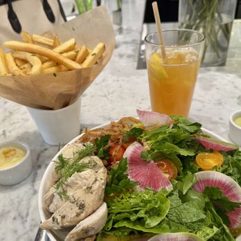The Daisy Restaurant - Baby kale salad with grilled chicken added, fries, Arnold Palmer. My version of the ideal lunch! - Farmers Market Near Me - Santa Barbara, California