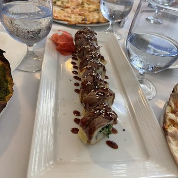 Gulfstream - a plate of food on a table - Italian Near Me - Southampton Gulfstream - a plate of food on a table - Italian Near Me - Southampton