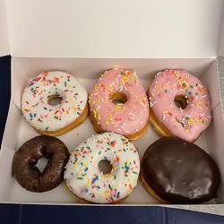 Jupiter Donuts - Vanilla iced, strawberry iced, chocolate Holland cream, chocolate cake iced.