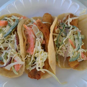 La Pasadita Taqueria - Fish tacos and a shrimp taco on the left there. I was skeptical about the sourkraut lookin stuff on top, but Oooooh it was good! - Street Vendors Near Me - Earlimart, California