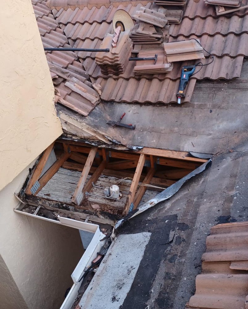 Slide of Guaranteed Roofing Solutions