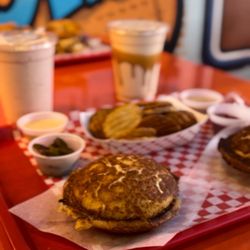 Pakistan double cheeseburger with fries and milkshake