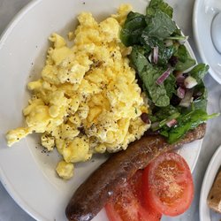 Bite Of Life - Scrambled eggs with sausage. I did request the salad & tomato. Sausage was dried out, but everything else was wonderful.