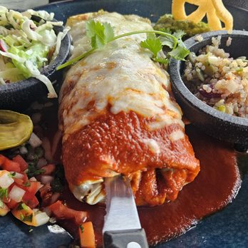 SOL Mexican Cocina - The Carnitas Burrito done Bandera Style (wet with melted cheese) was great. Next time I want to try a different meat for fun. - Mexican Near Me - Newport Beach, California SOL Mexican Cocina - The Carnitas Burrito done Bandera Style (wet with melted cheese) was great. Next time I want to try a different meat for fun. - Mexican Near Me - Newport Beach, California