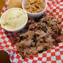 Pork with red slaw and loaded potato casserole.