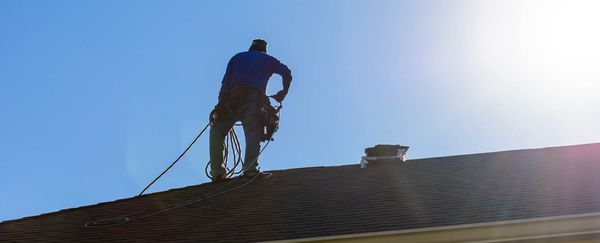 Walling Roofing & Construction Logo