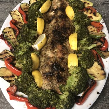 Grocery Outlet - Tide salmon bbqd on a cedar plank, surrounded by broccoli, peppers and zucchini - Grocery Near Me - Burbank, California