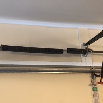 Freedom Overhead Doors - Help! Broken spring!! - Garage Door Services Near Me - Buford, Georgia