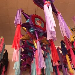 a bunch of tassels hanging from the ceiling