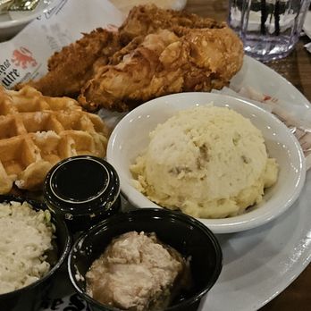 The Village Squire - Chicken and Waffles.Broasted chicken available on Sat., Sun & Mon. only.  May be on Fri.  Not sure. Comes with a packet of Hot Honey - American Near Me - South Elgin, Illinois