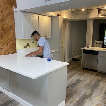 Synergy Construction SW Florida - Added bottom cabinet (pull out trash) and new countertops - General Contractors Near Me Synergy Construction SW Florida - Added bottom cabinet (pull out trash) and new countertops - General Contractors Near Me