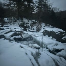 The white "mist" you see is the water flowing under the snow and ice.... The white "mist" you see is the water flowing under the snow and ice....