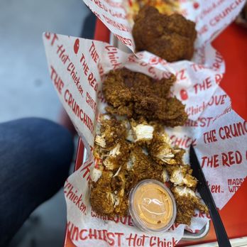 The Red Chickz - The 2 Chicken Tenders are yum. Cut one so you can see the juicy meat. - Chicken Shop Near Me - Carlsbad, California