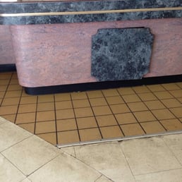 Broken buffet table, cracked floors and it's freezing cold in here. Waiting on food and I hope I don't regret it. Broken buffet table, cracked floors and it's freezing cold in here. Waiting on food and I hope I don't regret it.