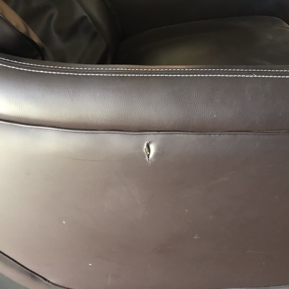 One inch hole in my massage chair.