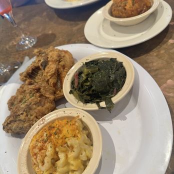 Five Sisters Blues Cafe - Fried chicken with baked in hair, dried Mac and cheese with canned sweet potatoes. Oh and my friend had unpalatable salty fish. - Southern Near Me - Pensacola, Florida