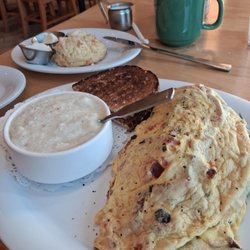 Omelet, grits, toast and scone.