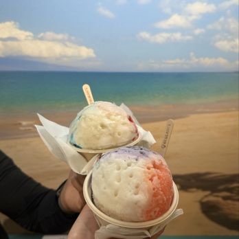 Ululani's - The top one was supposed to be coconut, leche, and tiger's blood. But they messed up and gave us a blue color syrup instead. - Shaved Ice Near Me - Chula Vista, California