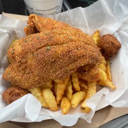 Fresh fried catfish fries and hushpuppies absolutely amazing Fresh fried catfish fries and hushpuppies absolutely amazing