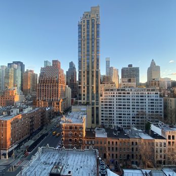 Copinette - Copinette (white façade, down on the left hand corner)  from our window at Beakman Tower - French Near Me - New York, New York