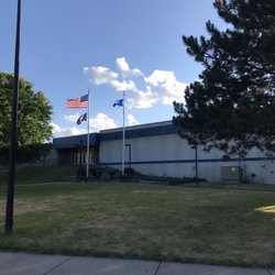 Fogerty Arena - Outside under a blue sky.