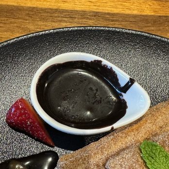 Finch & Fork - The Chocolate sauce for the Churro Dessert - Restaurant week 2024 - New American Near Me - Santa Barbara, California