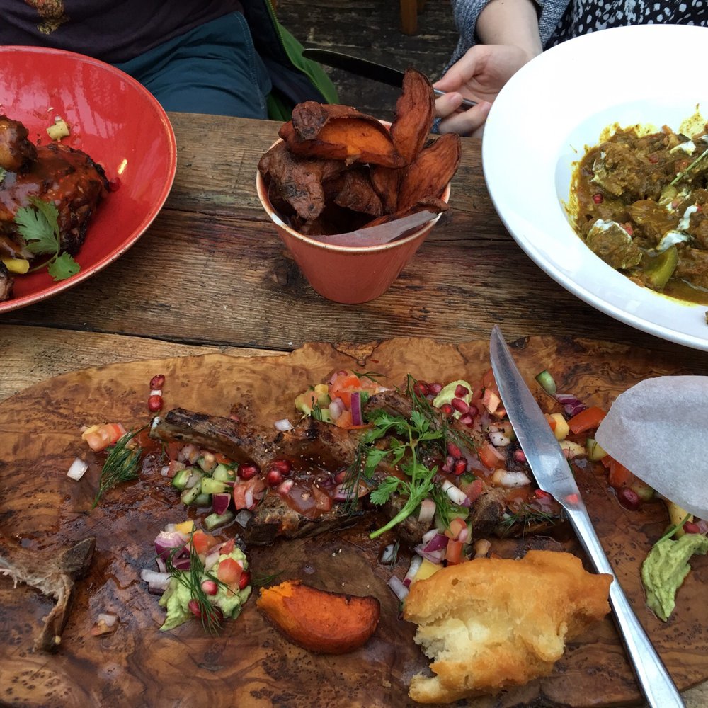 Jerk chicken, lamb (surprisingly spicy!), sweet potato wedges, fried dumplings (weirdly good) and goat curry.