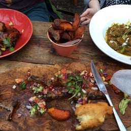 Jerk chicken, lamb (surprisingly spicy!), sweet potato wedges, fried dumplings (weirdly good) and goat curry.