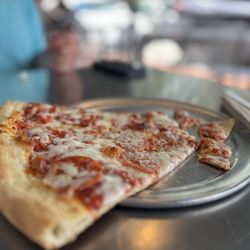 Vinnie Van Go-Go's - Pepperoni slice, outside seating