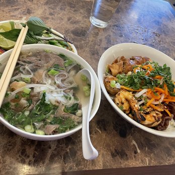 Pho Dinh - two bowls of food on a table - Vietnamese Near Me - Des Moines, Washington