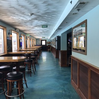The Last Resort - Long hall leads to restrooms with more dining tables. - Bars Near Me - Smithfield, Rhode Island